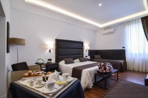 A bed or beds in a room at Hotel Palma Még 37 kép
