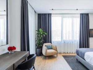 Postel nebo postele na pokoji v ubytování Mövenpick Hotel Lalez Durres