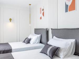 Postel nebo postele na pokoji v ubytování Mövenpick Hotel Lalez Durres