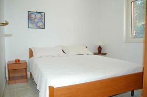 En eller flere senger på et rom på Villa Celeste Apartments Vieste -