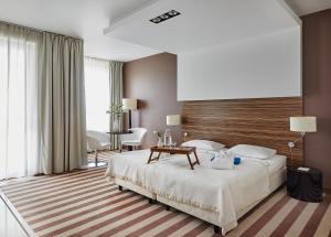 Posteľ alebo postele v izbe v ubytovaní Hotel Diva SPA