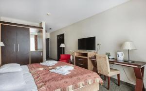 Posteľ alebo postele v izbe v ubytovaní Hotel Diva SPA