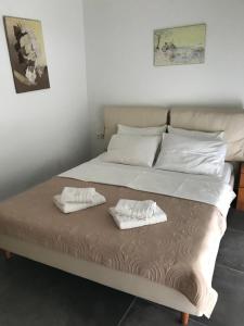 Postel nebo postele na pokoji v ubytování Apartment Michail