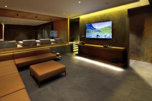 TV a/nebo společenská místnost v ubytování Grand Hotel Duca D'Este