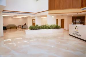 a lobby of a building with a sign that reads grand canyon at KTDC Grand Chaithram in Trivandrum