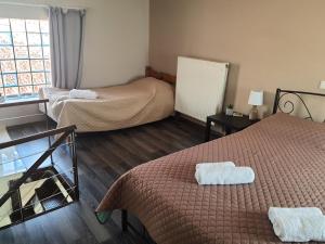 Posteľ alebo postele v izbe v ubytovaní Seaside Beach Apartment