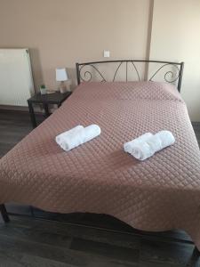 Posteľ alebo postele v izbe v ubytovaní Seaside Beach Apartment