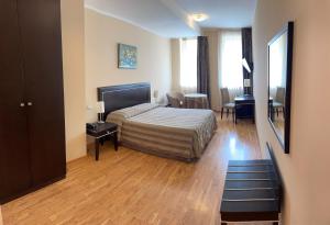 Postel nebo postele na pokoji v ubytování Hotel Villa Cinzia + 37 fotografií