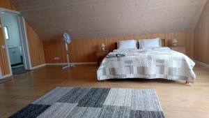 Postel nebo postele na pokoji v ubytování Rönne Majutus