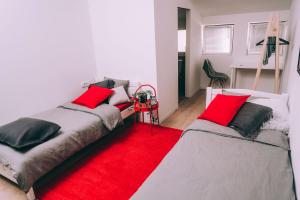 Posteľ alebo postele v izbe v ubytovaní X Rooms