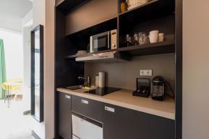 Kuchyň nebo kuchyňský kout v ubytování Nena Apartments - Kreuzberg 61