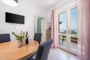 TV a/nebo společenská místnost v ubytování Apartments Vilma
