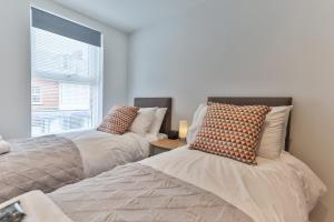 Ένα ή περισσότερα κρεβάτια σε δωμάτιο στο Finest Retreats - 13 Belle House - Apartment 3