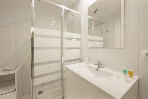 Koupelna v ubytování Romana Playa studio Elviria