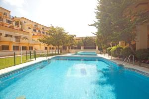 Bazén v ubytování Romana Playa studio Elviria nebo v jeho okolí