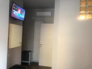 TV a/nebo společenská místnost v ubytování Tom & Jerry