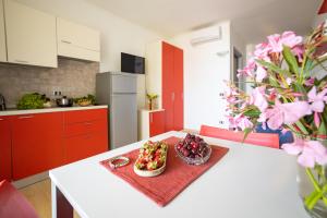 Кухня или мини-кухня в Residence Mediterraneo

