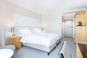 Krevet ili kreveti u jedinici u okviru objekta Radisson Blu Scandinavia Hotel Aarhus