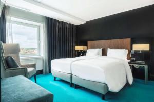 Krevet ili kreveti u jedinici u okviru objekta Radisson Blu Scandinavia Hotel Aarhus