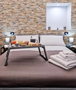 Posteľ alebo postele v izbe v ubytovaní Terra Mia Savoia B&B