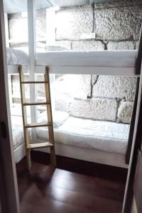 Een stapelbed of stapelbedden in een kamer bij Villa 33 