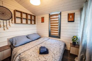 Postel nebo postele na pokoji v ubytování Bohemian Homes - Buddha