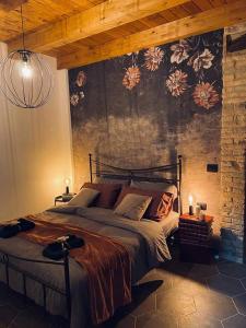 Tempat tidur dalam kamar di B&B Il Fabbro Chambre