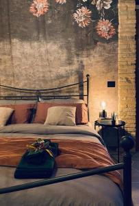 A bed or beds in a room at B&B Il Fabbro Chambre