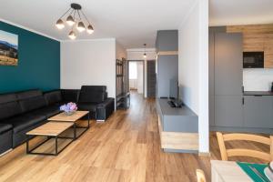 Posedenie v ubytovaní Apartamenty Pod Lasem z klimatyzacją i 2 sypialniami - Dream Apart