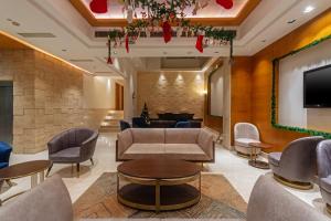TV a/nebo společenská místnost v ubytování Hotel Saket 27