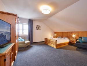 Un pat sau paturi într-o cameră la Hotel Alter Wirth