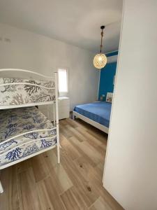 Postel nebo postele na pokoji v ubytování Il Corallo + 127 fotografií