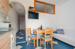 Kuchyň nebo kuchyňský kout v ubytování Apartments Molo Mare