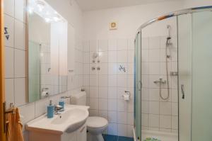Kúpeľňa v ubytovaní Apartments Molo Mare