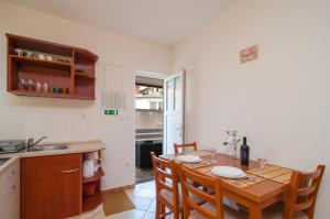Kuchyňa alebo kuchynka v ubytovaní Apartments Molo Mare