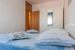 Postel nebo postele na pokoji v ubytování Apartment Marija