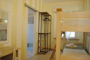 Postel nebo postele na pokoji v ubytování Dreaming Piazza Erbe Rooms