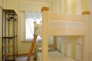 Postel nebo postele na pokoji v ubytování Dreaming Piazza Erbe Rooms