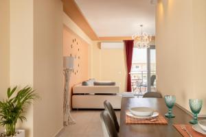 A seating area at Gold Olive Suites by "elite"