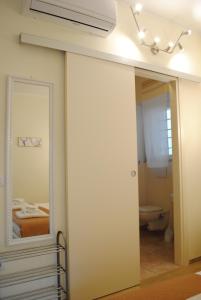 Koupelna v ubytování Dreaming Piazza Erbe Rooms