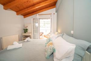Łóżko lub łóżka w pokoju w obiekcie La Perla Loft Luxury living