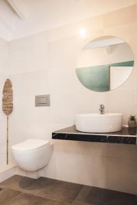 A bathroom at Gold Olive Suites by "elite"