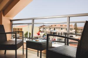 A balcony or terrace at Gold Olive Suites by "elite"