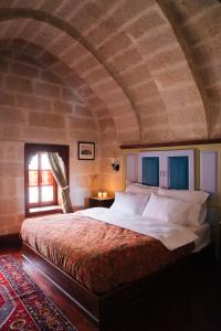 Llit o llits en una habitació de Gul Konakları - Sinasos - Special Category