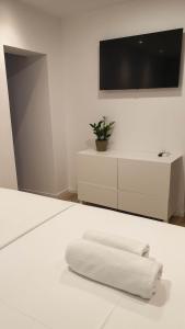 TV a/nebo společenská místnost v ubytování Fiorino Rooms Korčula