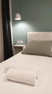 科尔丘拉菲欧力诺旅馆客房内的一张或多张床位