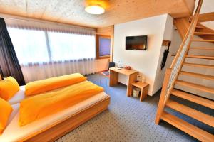 TV a/nebo společenská místnost v ubytování Hotel Wetterhorn