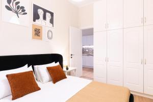 En eller flere senge i et værelse på Casa Moderna -Two Bedroom Apartment