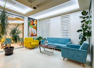 Rubicon Garni Hotel的休息区
