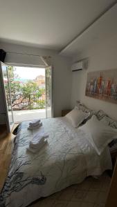 Postel nebo postele na pokoji v ubytování Luxury APARTMAN BILI